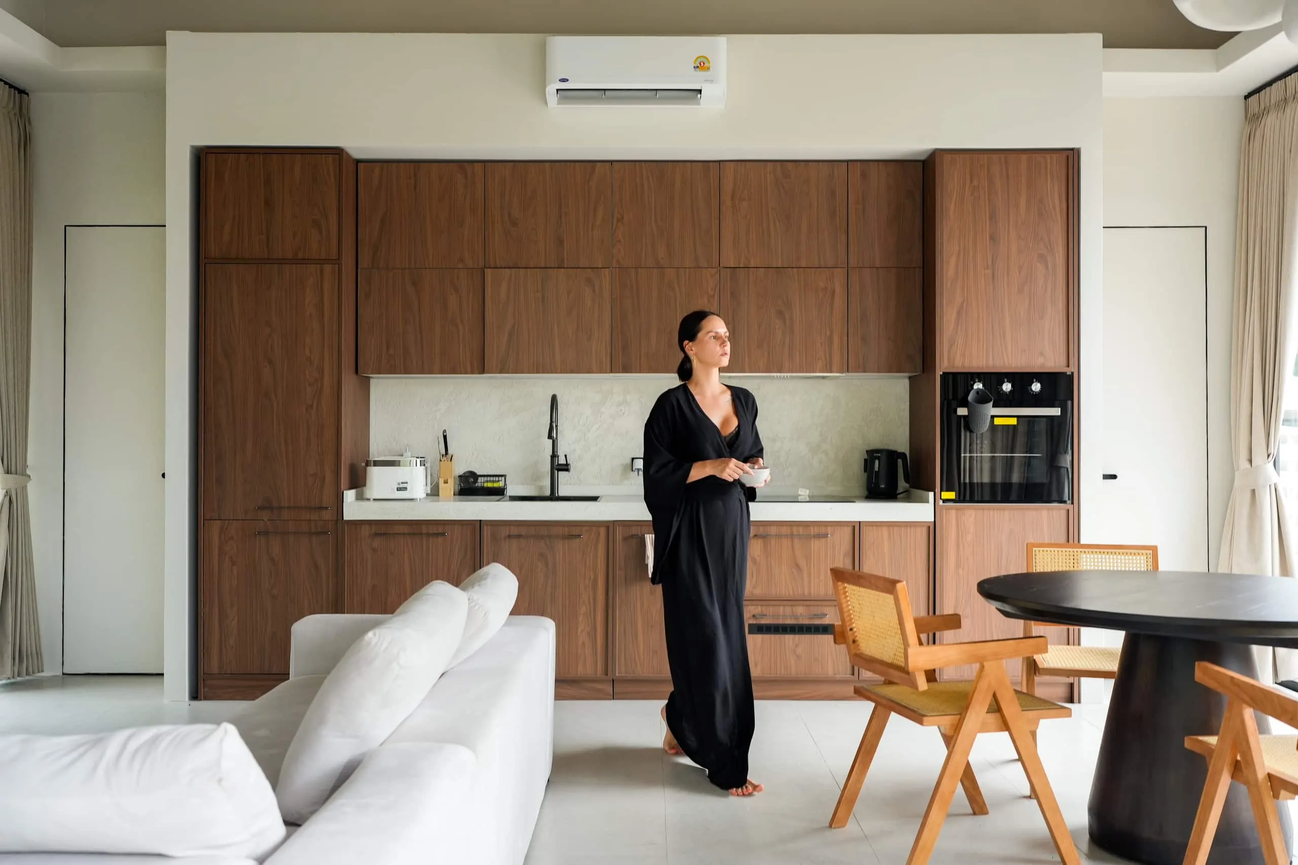 Villa II — full walnut kitchen with stone counter and built-in oven