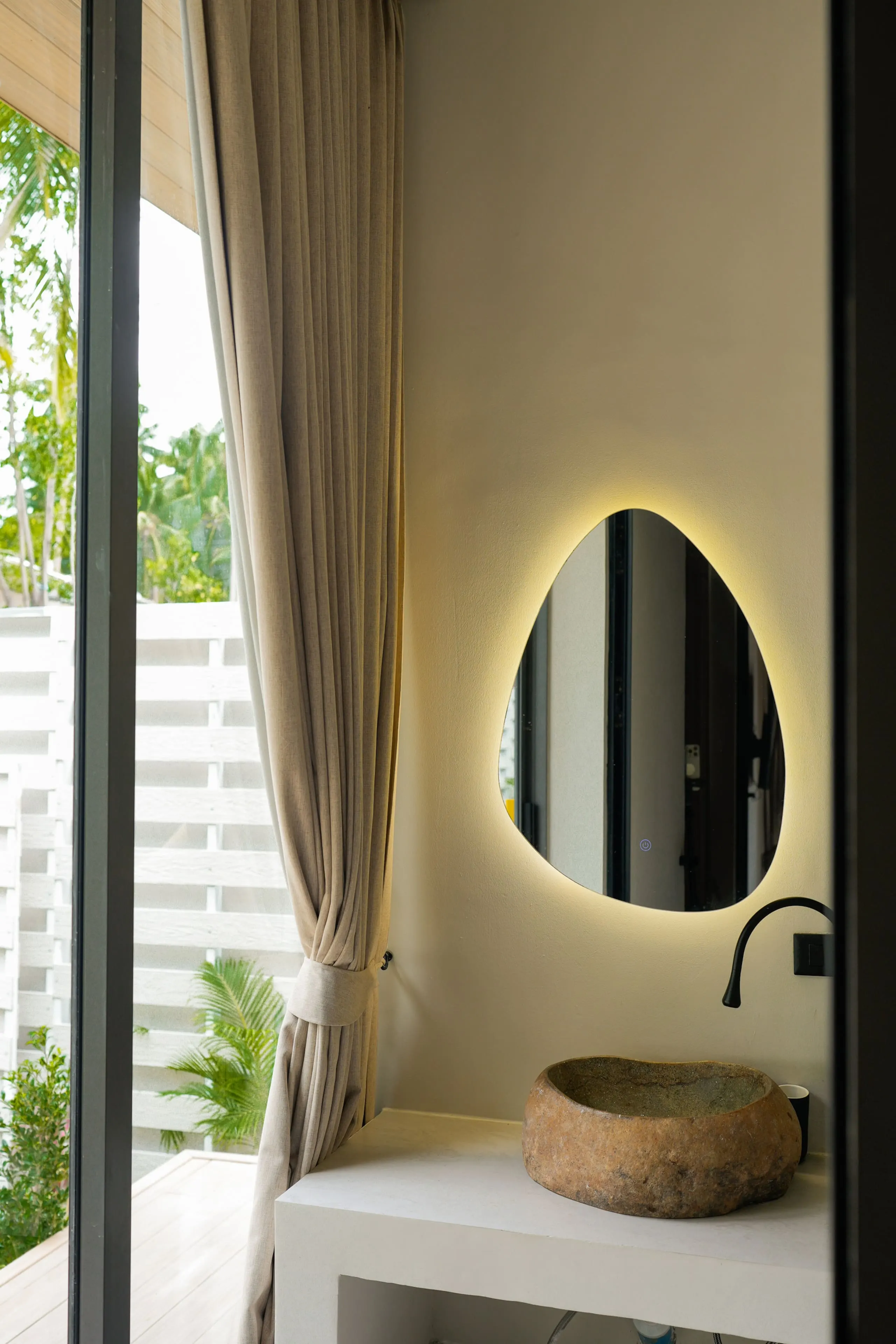 Villa II — bathroom two, stone basin by the curtained glazing