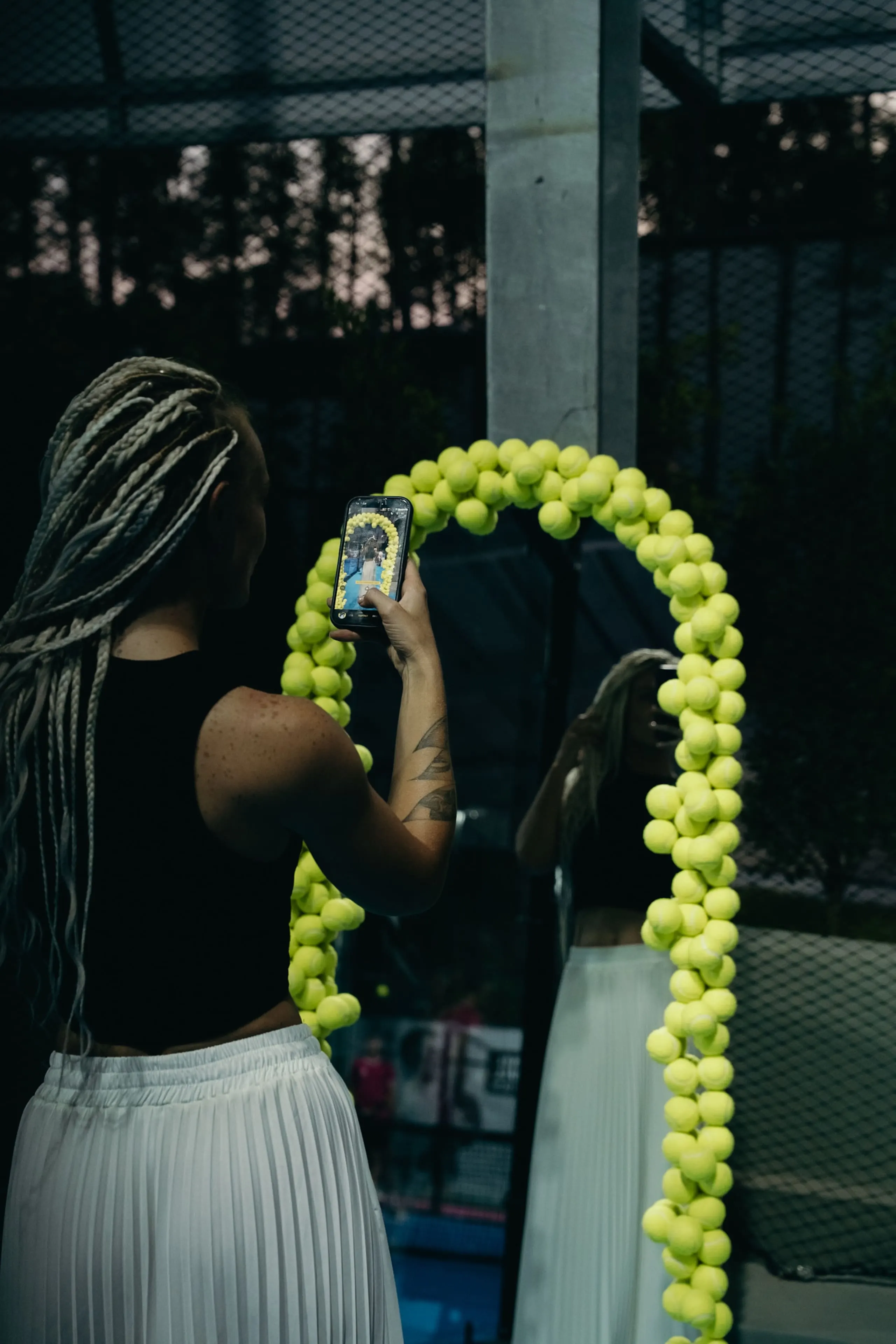 Mirror photo spot at the padel club at dusk