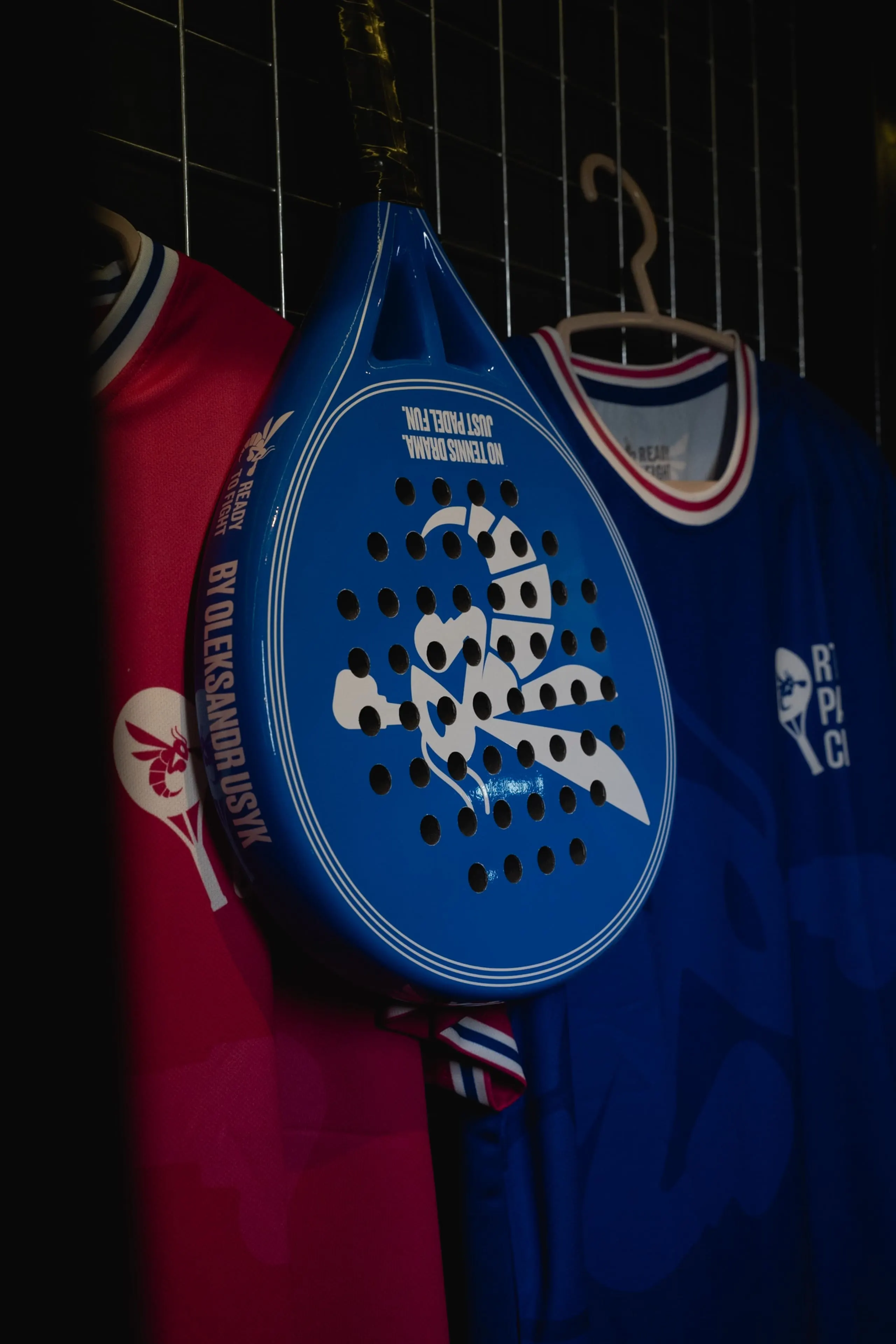 Padel racket by Oleksandr Usyk on the club wall